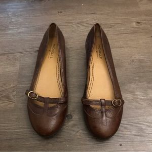 Brown leather flats